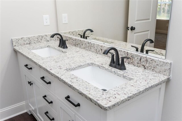 262 Stephens Rd, Cedartown, GA 30125 - bathroom with double vanity and baseboards