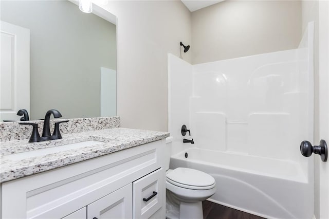 262 Stephens Rd, Cedartown, GA 30125 - bathroom featuring vanity, toilet, wood finished floors, and shower / tub combination