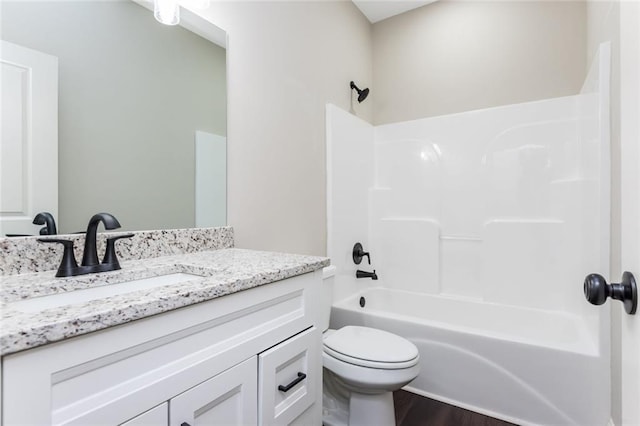 262 Stephens Rd, Cedartown, GA 30125 - bathroom featuring vanity, washtub / shower combination, and wood finished floors