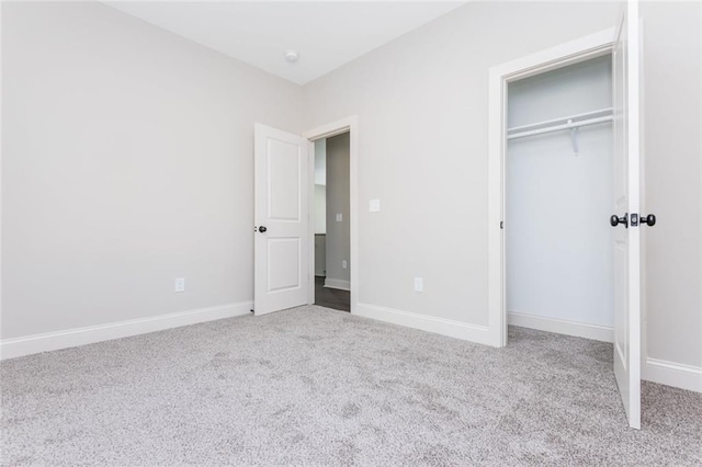 262 Stephens Rd, Cedartown, GA 30125 - unfurnished bedroom featuring carpet floors, a closet, and baseboards
