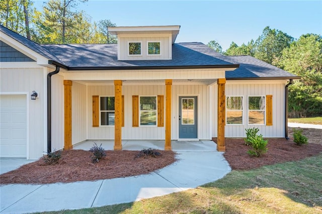 262 Stephens Rd, Cedartown, GA 30125 - modern farmhouse with covered porch, an attached garage, and a shingled roof