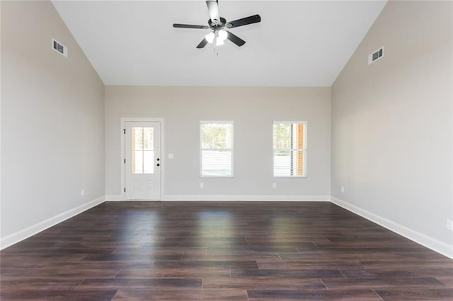 262 Stephens Rd, Cedartown, GA 30125 - unfurnished living room featuring a ceiling fan, healthy amount of natural light, baseboards, dark wood-style floors, and high vaulted ceiling