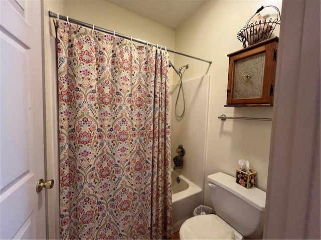 full bath with toilet and shower / tub combo with curtain