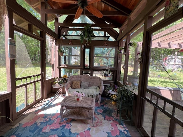 sunroom / solarium with plenty of natural light and a ceiling fan