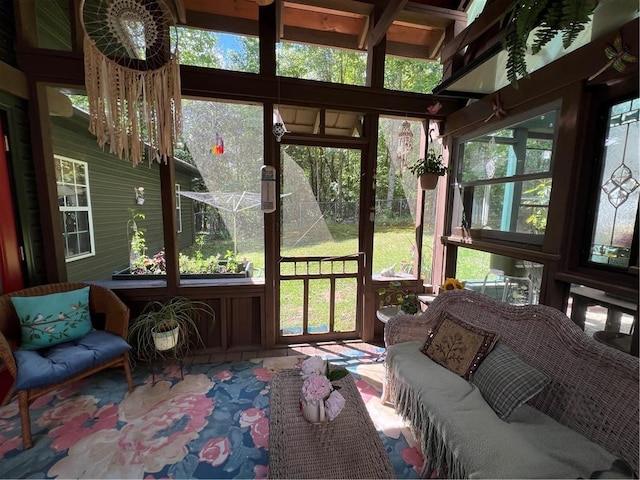 sunroom / solarium featuring an outdoor living space