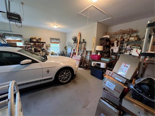 garage featuring a garage door opener