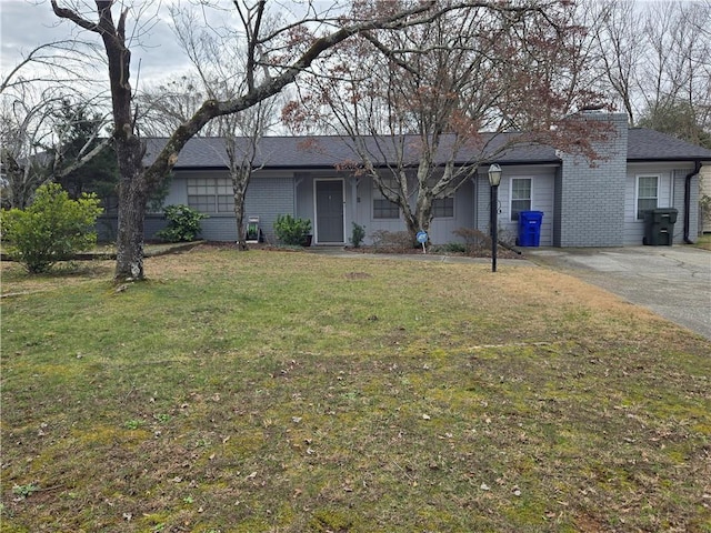 ranch-style house with a front lawn