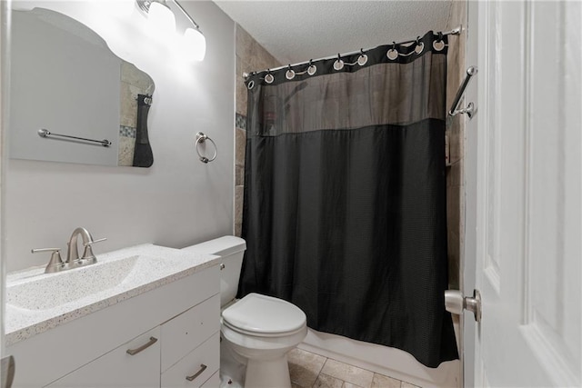 full bathroom with shower / bath combination with curtain, vanity, toilet, and a textured ceiling