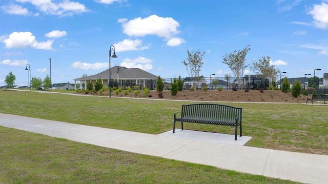 view of community with a lawn