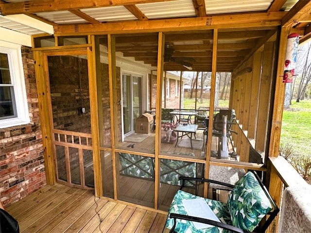 unfurnished sunroom with a wealth of natural light