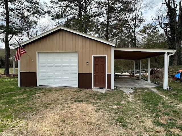 garage with a garage and driveway