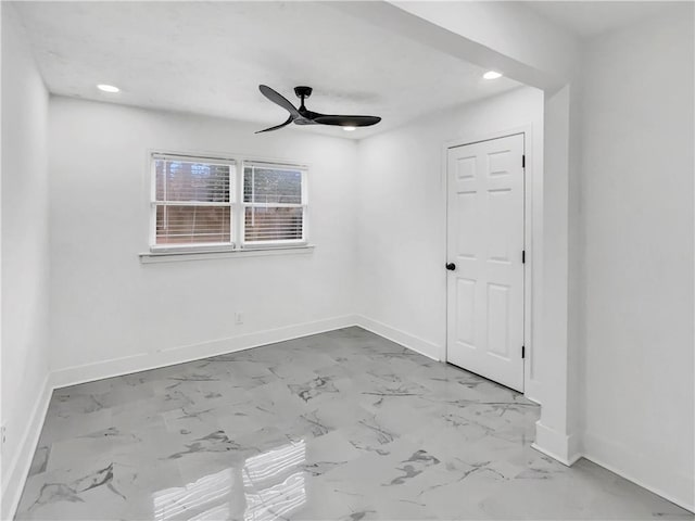 empty room featuring ceiling fan