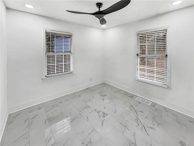 empty room with ceiling fan