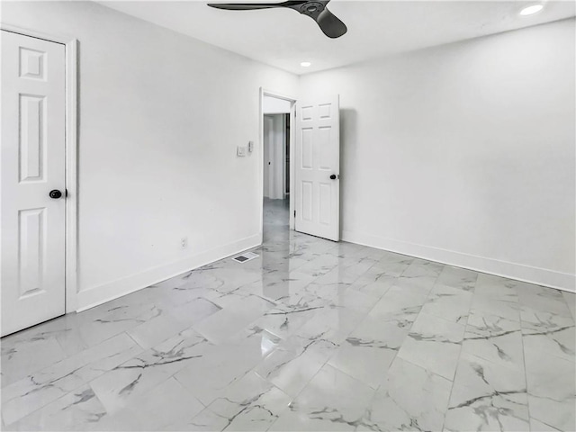 unfurnished room featuring ceiling fan