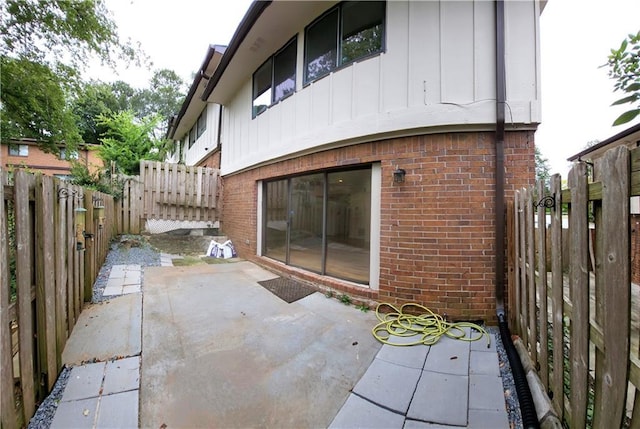 rear view of house with a patio