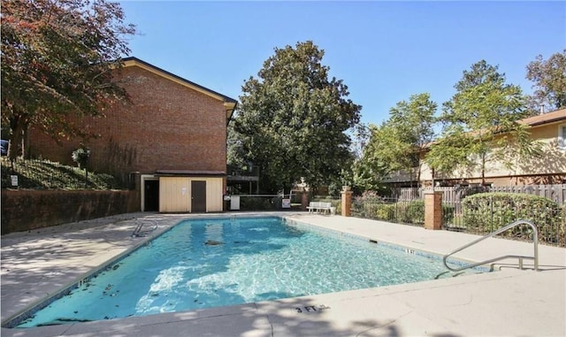 view of pool featuring a patio area