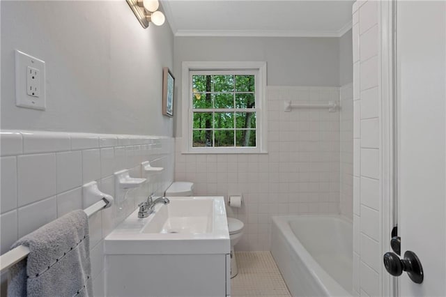 full bath with tile patterned flooring, vanity, toilet, tile walls, and ornamental molding