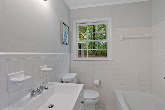 bathroom featuring vanity, ornamental molding, toilet, and tile walls
