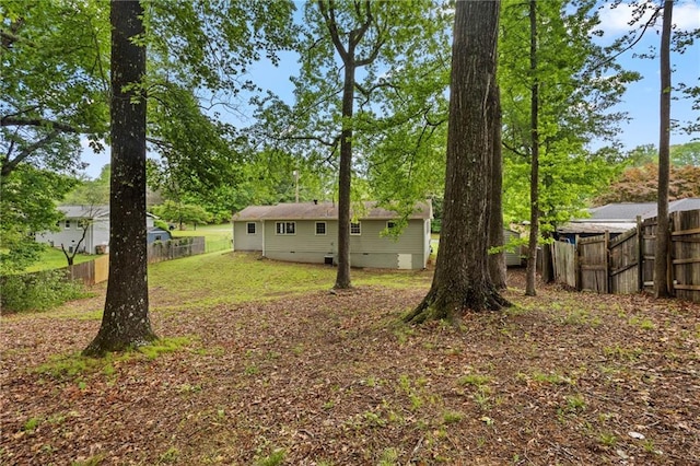 view of yard with a fenced backyard