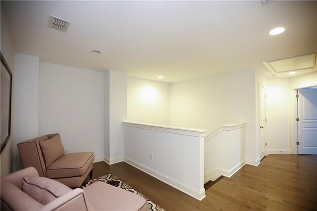 sitting room featuring dark hardwood / wood-style floors