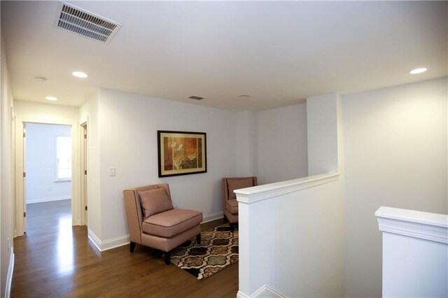 living area with dark wood-type flooring