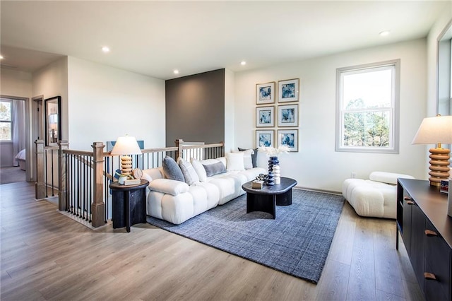 living room featuring recessed lighting and wood finished floors