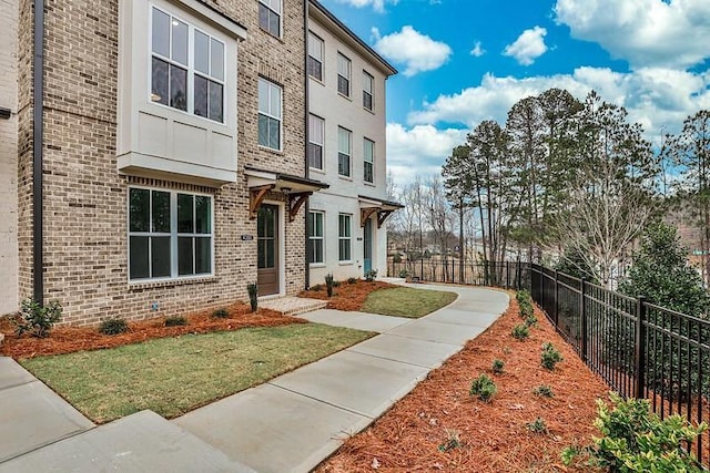 exterior space featuring a lawn