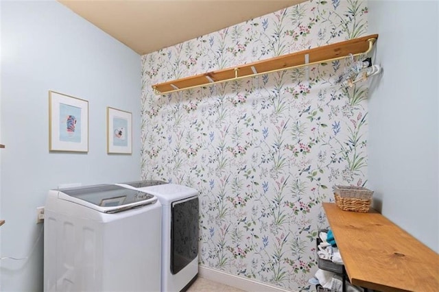 clothes washing area featuring washing machine and clothes dryer