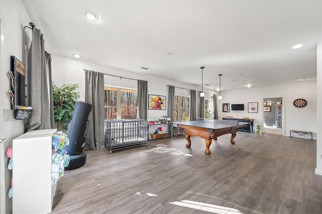 recreation room with hardwood / wood-style flooring and billiards