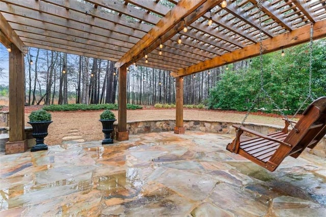 view of patio featuring a pergola