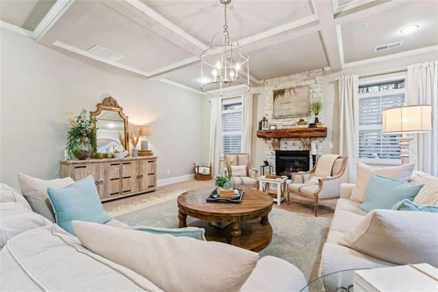 living room featuring baseboards, coffered ceiling, plenty of natural light, and a fireplace