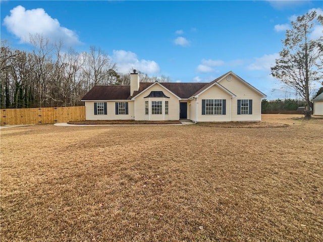 single story home with a front lawn