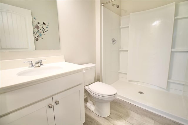 243 Hummingbird Trl, Dallas, GA 30132 - full bath with a shower, vanity, and wood finished floors