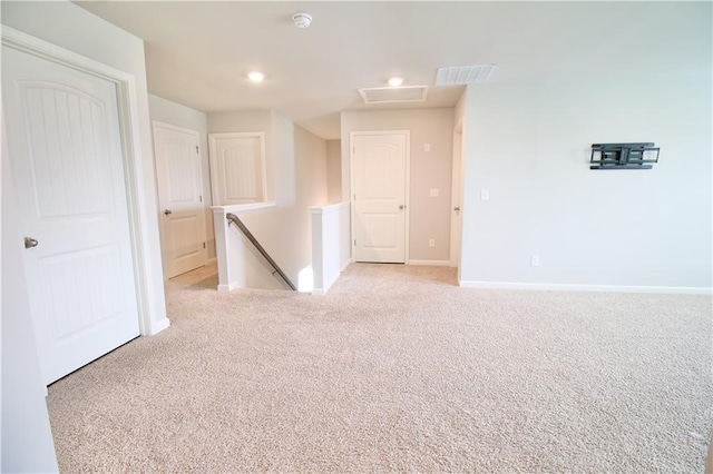 243 Hummingbird Trl, Dallas, GA 30132 - empty room featuring light colored carpet, attic access, and a smoke detector