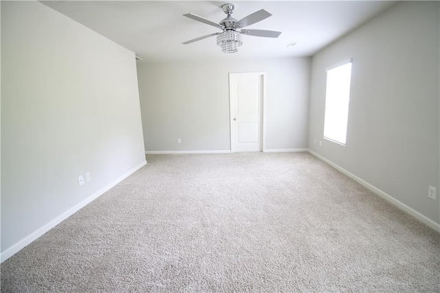 243 Hummingbird Trl, Dallas, GA 30132 - carpeted spare room with baseboards and a ceiling fan