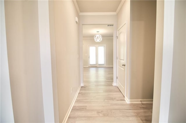 243 Hummingbird Trl, Dallas, GA 30132 - hallway with crown molding and light wood-style floors