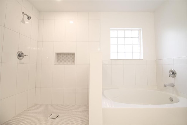 243 Hummingbird Trl, Dallas, GA 30132 - full bath featuring a bath and a tile shower