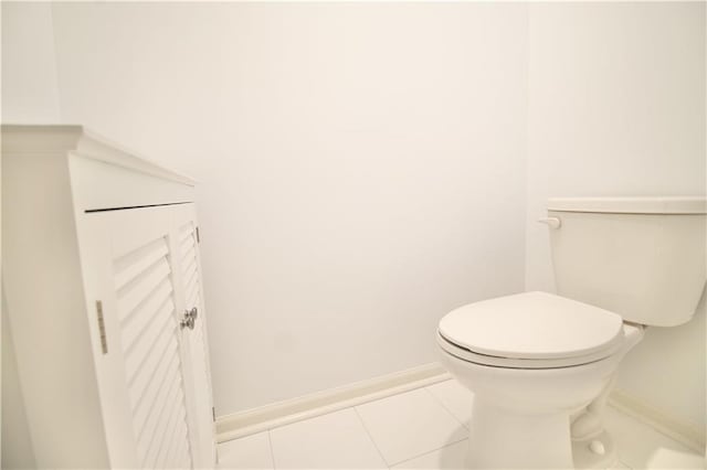 243 Hummingbird Trl, Dallas, GA 30132 - bathroom featuring baseboards and tile patterned flooring