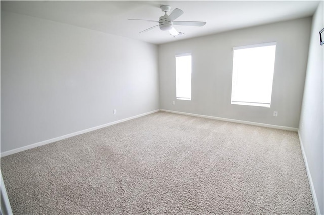 243 Hummingbird Trl, Dallas, GA 30132 - carpeted empty room with baseboards and a ceiling fan