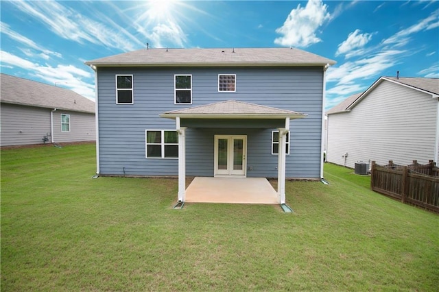 243 Hummingbird Trl, Dallas, GA 30132 - rear view of house featuring a patio, a lawn, and french doors