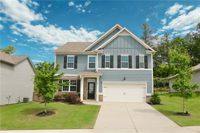 243 Hummingbird Trl, Dallas, GA 30132 - craftsman-style home with board and batten siding, an attached garage, driveway, brick siding, and a front yard