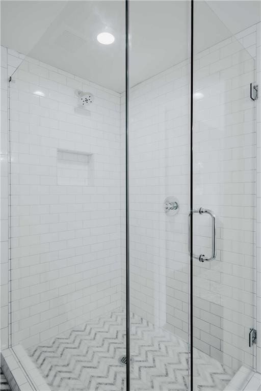 full bath featuring a stall shower