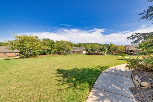 view of property's community featuring a patio