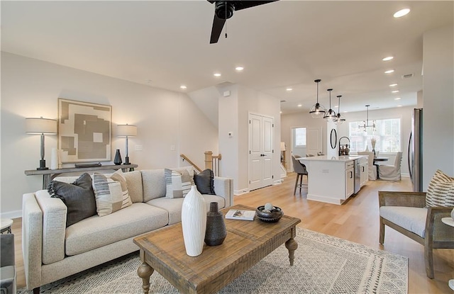 3352 Cranston Ln, Kennesaw, GA 30144 - living area with a ceiling fan, recessed lighting, light wood-type flooring, and baseboards