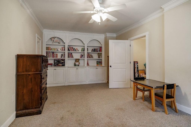 interior space featuring light carpet, baseboards, ornamental molding, and a ceiling fan