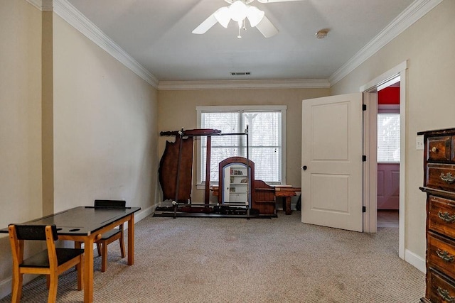 interior space with light carpet, visible vents, ornamental molding, and baseboards