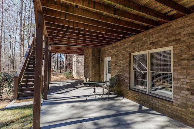 view of patio featuring stairs