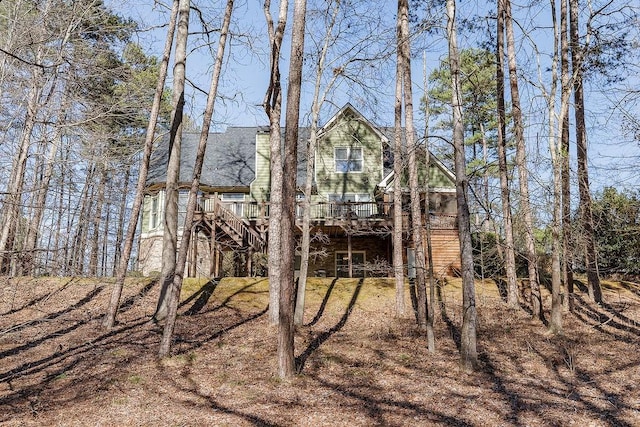 exterior space featuring stairway and a deck