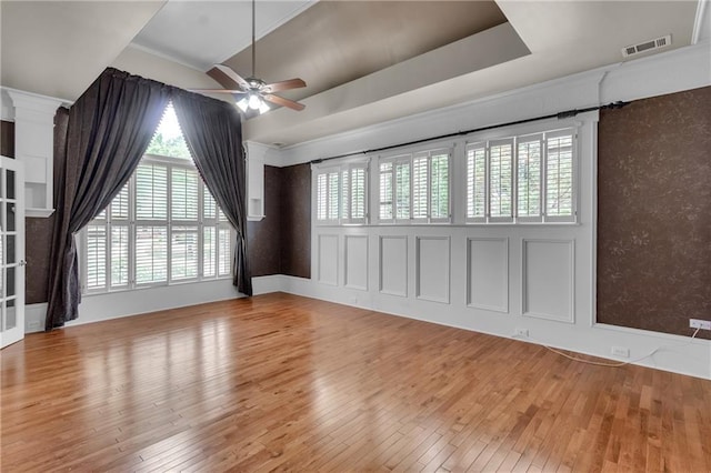 470 Manor Oak Ln SE, Marietta, GA 30067 - spare room featuring hardwood / wood-style flooring, a ceiling fan, and crown molding