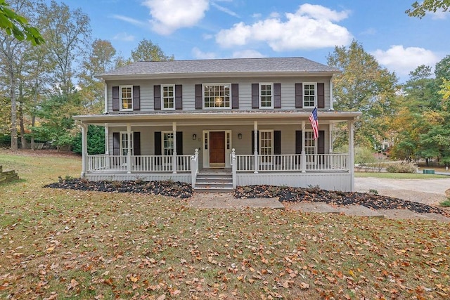 view of front of home featuring a porch and a front lawn